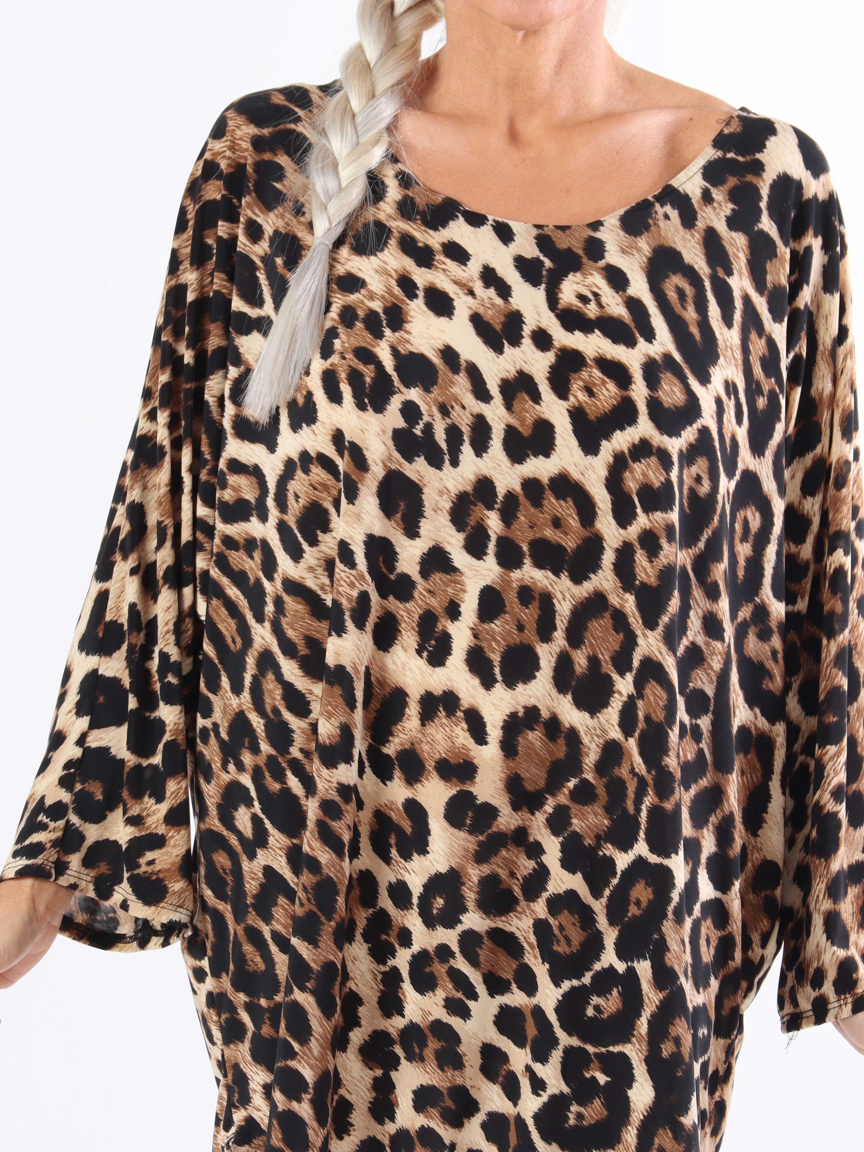 Augustine - Plus size bluse i elastisk stof med flagermusærmer